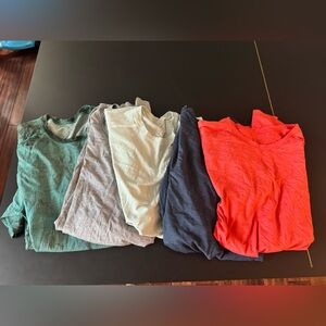 Five lululemon dry fit shirts size XL- great condition